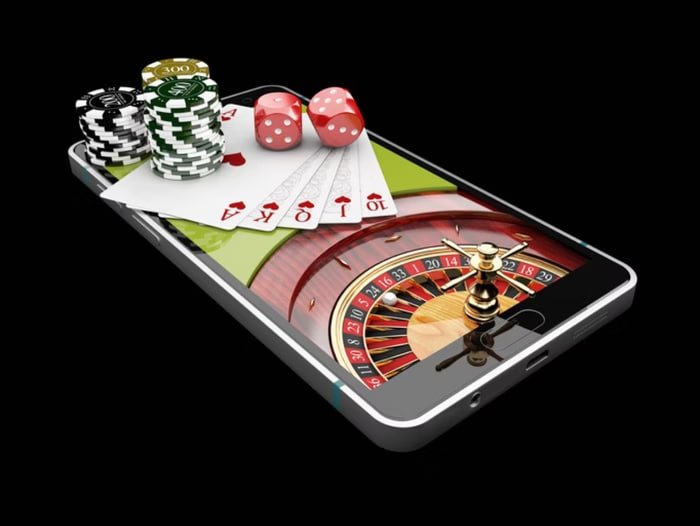 ph888 player reviewing betting options and odds on a mobile phone in the Philippines